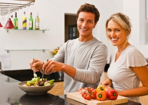 newlywed cooking together